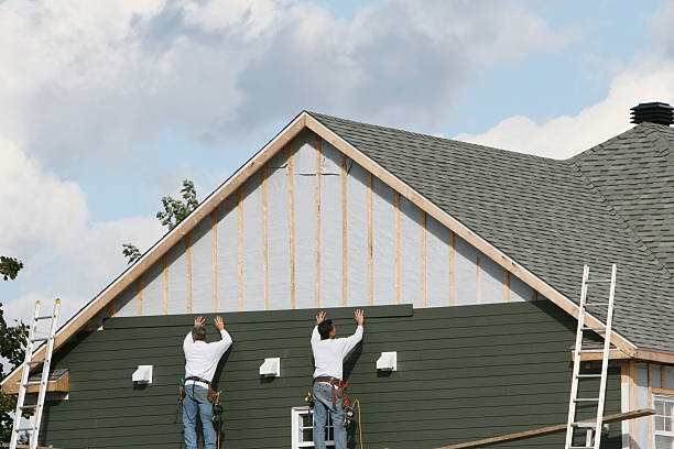 Professional Storm Damage Siding Repair technician working in White, PA